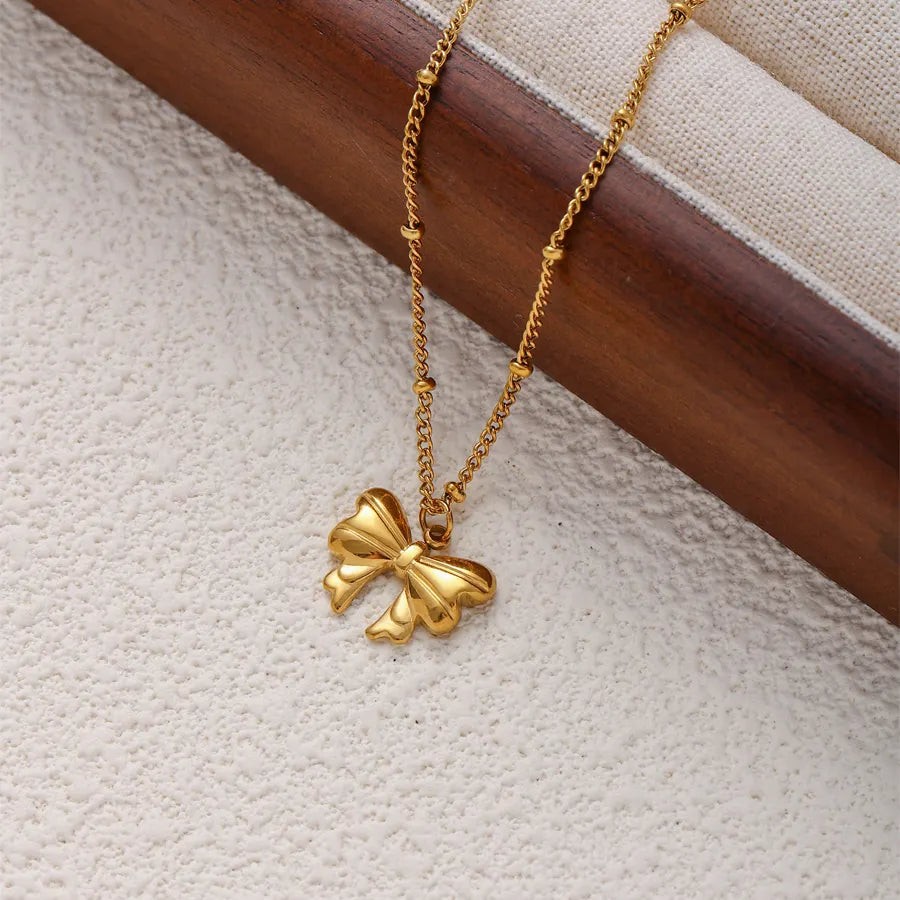 Tiny Bow Charm Necklace