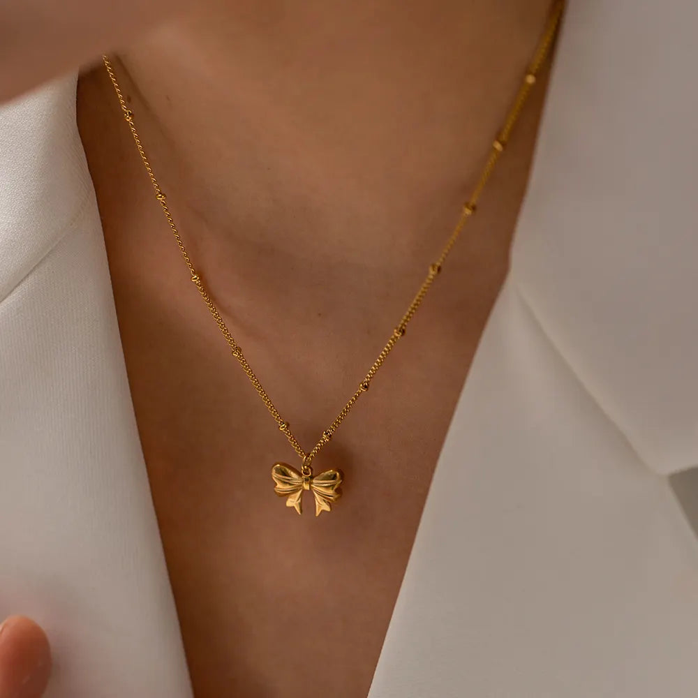 Tiny Bow Charm Necklace