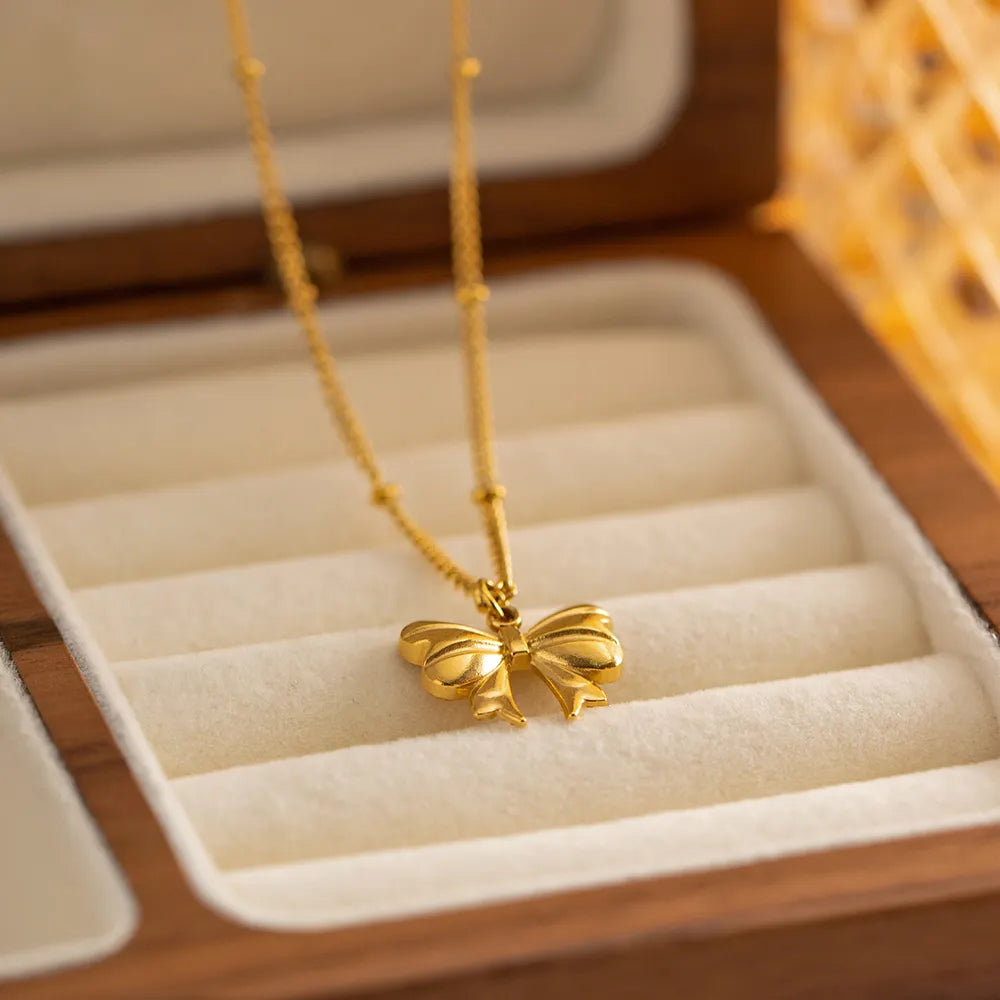 Tiny Bow Charm Necklace